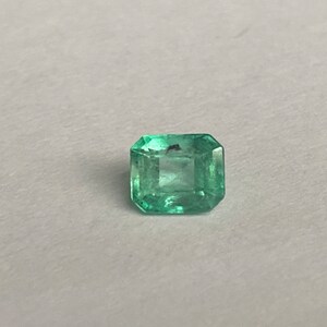 0.61 carats , Genuine Colombian emerald -cut loose, gemstone, natural emerald