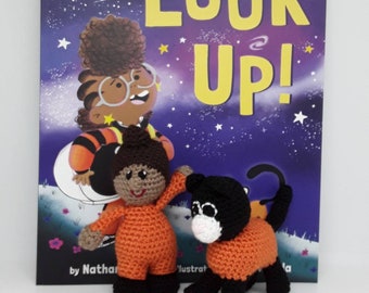 Girl and cat crochet characters with space story book storybag