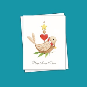 Répandez la chaleur et la paix avec notre carte de correspondance de Noël d'espoir, d'amour et de paix