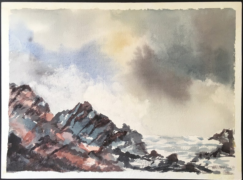 May include: A watercolor painting of a rocky coastline with crashing waves and a cloudy sky. The sky is a mix of gray, blue, and white, with a hint of yellow in the center. The rocks are a dark gray and brown, with some areas of white foam from the waves.