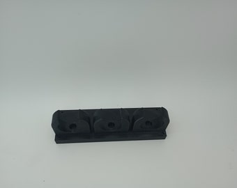 Baseball bat holder, wall mount.