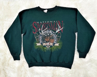 Sudadera vintage de los 80 y 90 con diseño de alce para hombre, talla L, color verde, ideal para actividades al aire libre, inspirada en la vida silvestre de las Montañas Rocosas. Estilo "Abuelo".