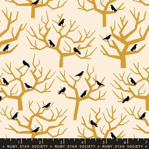May include: A seamless pattern featuring black crows perched on bare branches with a mustard yellow color. The background is a light cream color.