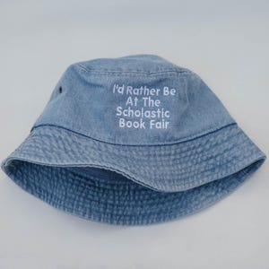 I&#39;d Rather Be At The Scholastic Book Fair Embroidered Bucket Hat