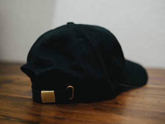 dog with baseball hat