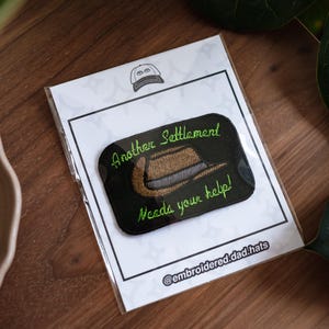 Another Settlement Needs Your Help Embroidered Patch
