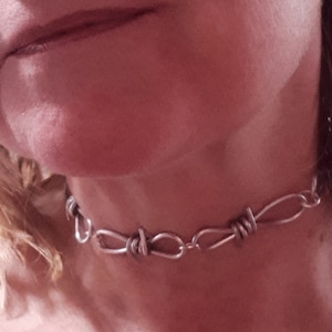 Handmade barb wire chain link necklace. Can be made in various lengths 14 in, 16in, 18in, 20in or 22in.