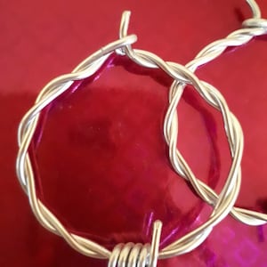 Handmade silver aluminium barb wire hoops for stretched ears only