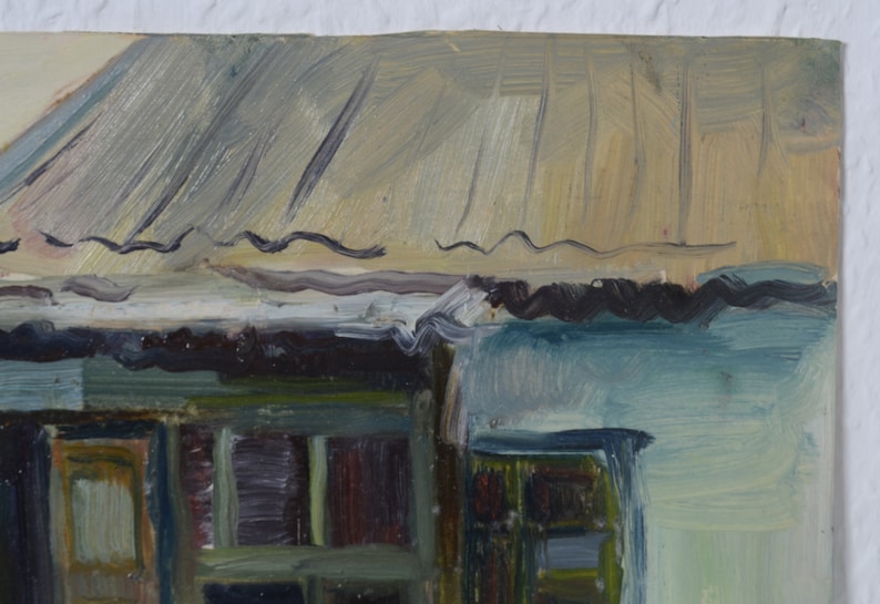 May include: A close-up of a painting depicting a building with a corrugated metal roof and windows. The building is painted in shades of blue, brown, and green.