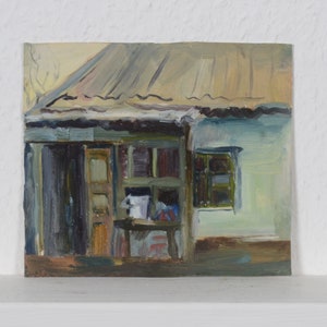 May include: A painting of a small, weathered building with a brown roof and a single window. The building is painted in shades of blue and green, and the window is framed in white. The painting is done in a realistic style.