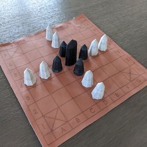 Brandubh Resin & Stone Board Game Set - Black  King and Defenders, Gray Stone Attackers