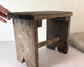 old shabby wooden stool or home side table, Short vintage weathered wood stools