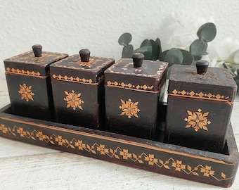 vintage spice organizer shelf. set of kitchen box. black wooden tabletop kitchen décor.