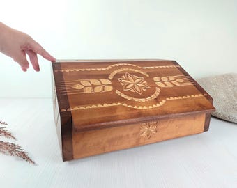 vintage carved wooden bread box. handmade lidded tabletop shelf for baked goods. rustic country kitchen organizer