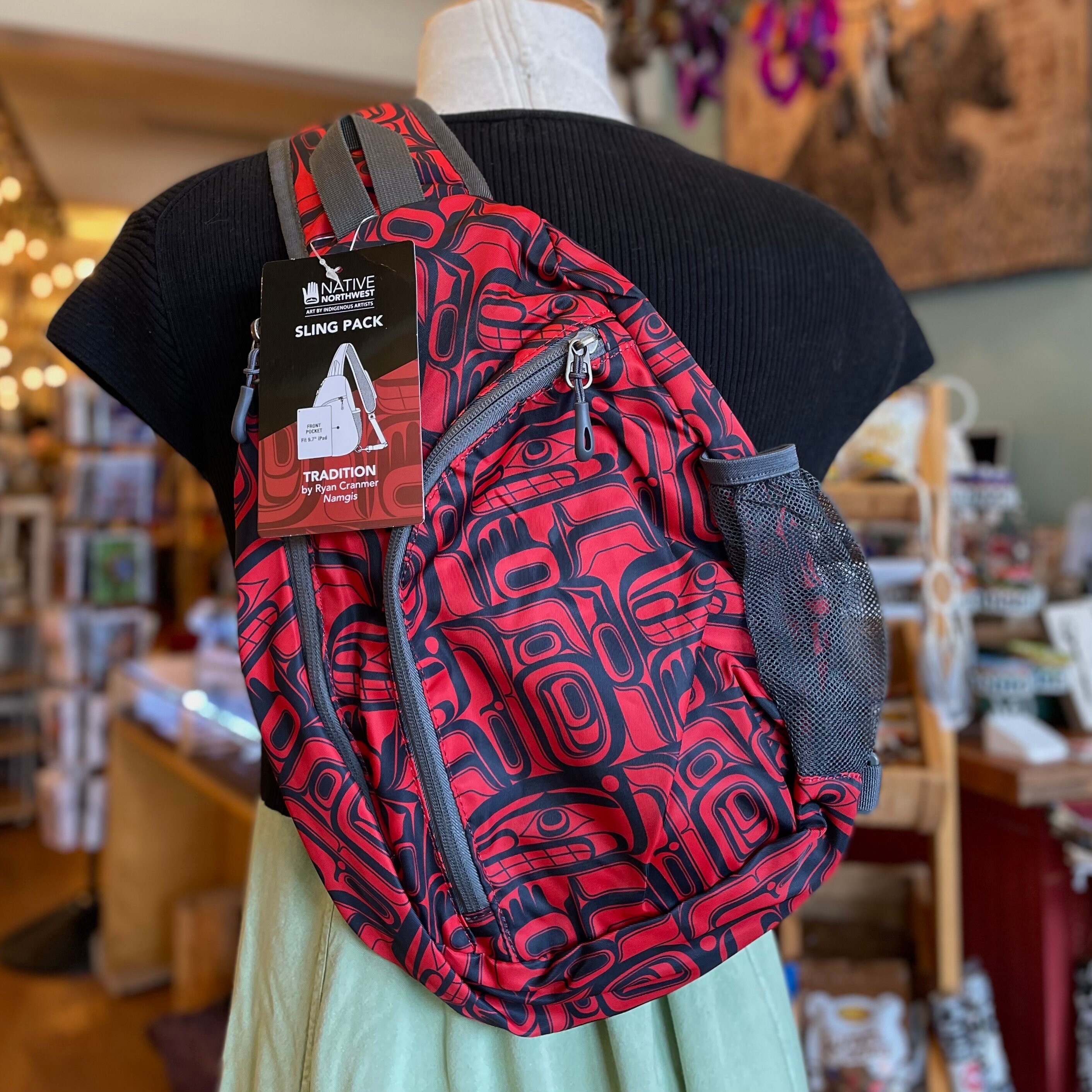 Native Designed Sling Pack; Crossbody Bag; Day Pack; Small  Kavu Tribal Print Backpack in Teal, Red, Black & Cream main image 0