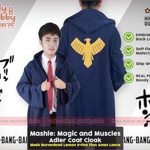 May include: Navy blue Adler coat cloak with a gold eagle emblem on the back. The cloak has a hood and is made of soft fleece material. The text "Mashle: Magic and Muscles" is visible.