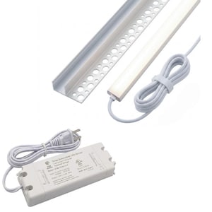 May include: A white LED light bar with a matching aluminum mounting channel featuring perforated edges, accompanied by a white power cord and a rectangular white Triac dimmable LED driver with a two-prong plug and printed technical specifications.
