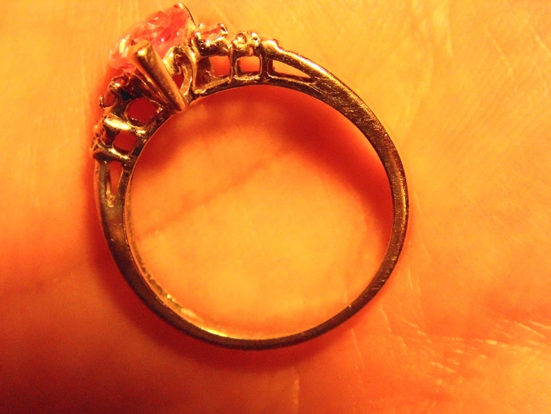 Pink Heart Topaz in 10k white gold with Diamonds pink topaz on either side