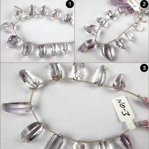 May include: Strands of faceted, clear and lavender-hued gemstones strung on a thin, gold-colored wire. The gemstones are teardrop and oval shaped. The image is divided into three sections, each showing a different view of the gemstone strands.