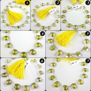 Puede incluir: Hilos de cuentas de piedras preciosas de color amarillo claro con un acabado pulido. Cada hilo presenta una borla de hilo amarillo brillante. Las cuentas están ensartadas en un cordón fino y transparente. Cada hilo está etiquetado con un número del 1 al 7.