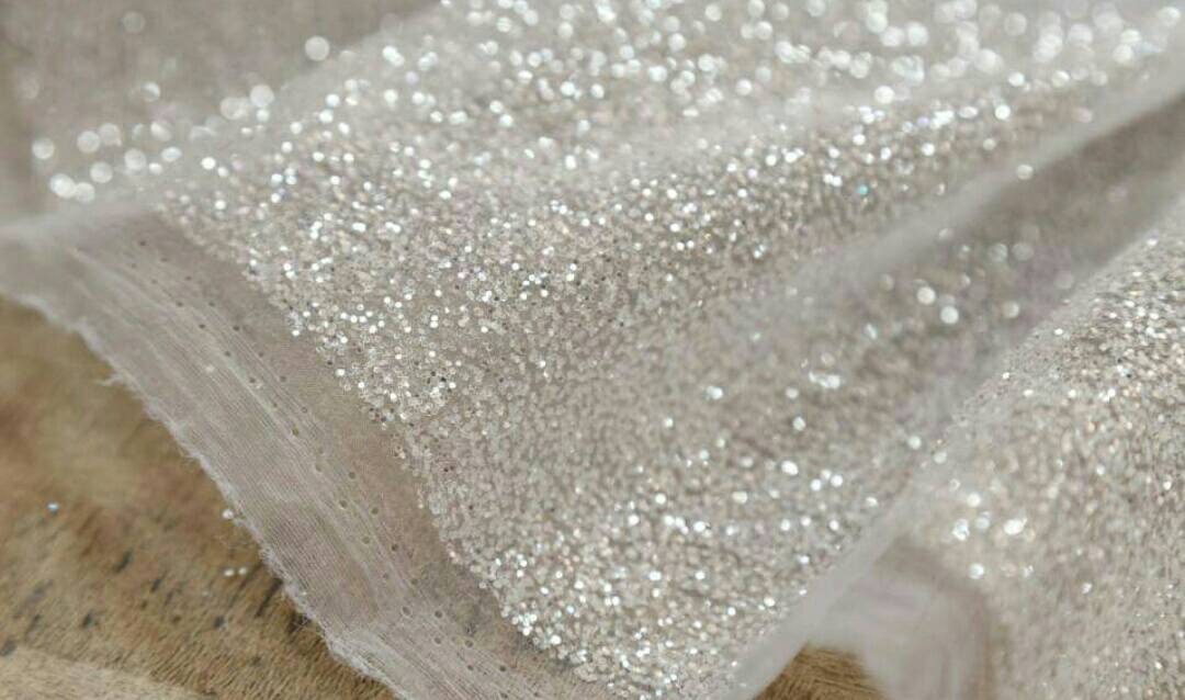 Shimmering Silver Glitters Glued Off-white Tulle Mesh - OneYard