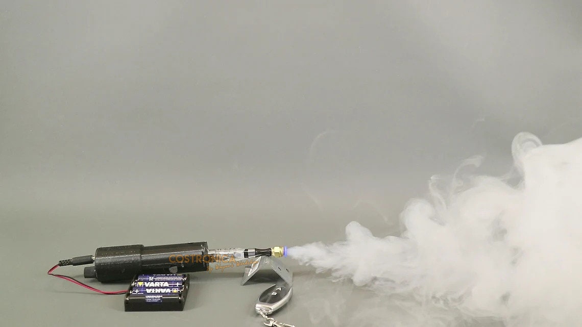 Mini machine à fumée, machine à fumée, machine à brouillard, machine à  fumée portable, convient pour accessoires de tir, effet fumée, test de flux  d'air, cosplay : : Instruments de musique, scène