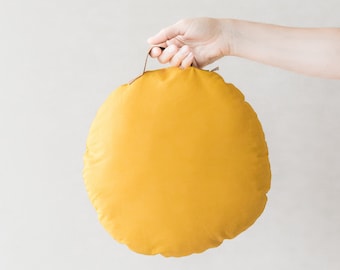 Portable children's pillow with handle in eco-leather white, pink, light blue, mustard, blue, aqua green and mauve