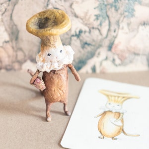 Cat in a mushroom costume made of cotton yarn, anthropomorphic animal, magical forest, mushroom character, mushroom figurine, mushroom decoration