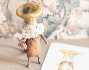 Cat in a mushroom costume made of cotton yarn, anthropomorphic animal, magical forest, mushroom character, mushroom figurine, mushroom decoration