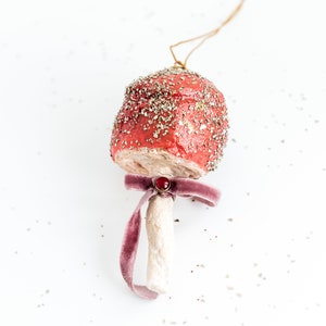 Vintage inspired red mushroom decoration with glitter and ribbon