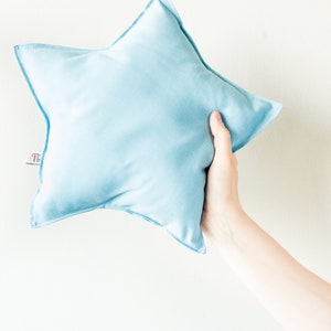 almohada en forma de estrella Azul