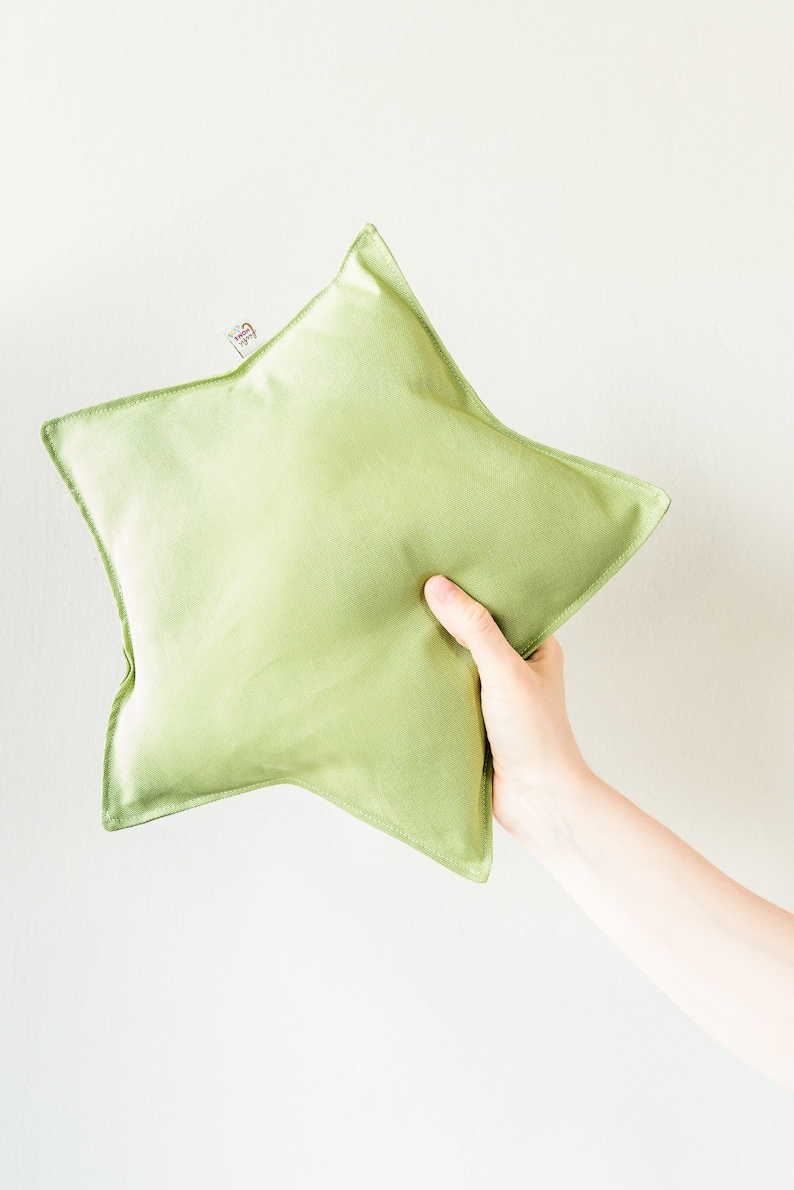 almohada en forma de estrella Verde