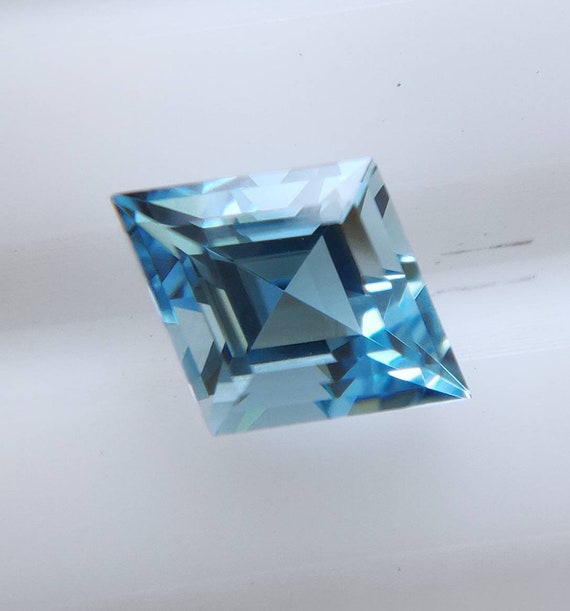 Swiss Blue Topaz Beautiful Blue Color Lozenge shape Excellent Step cut 9x7mm 1.13cts AAA Grade in Wholesale Price from India
