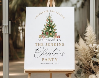 May include: A white sign with a gold border and text that reads "Celebrate the Season". A watercolor illustration of a Christmas tree with ornaments and presents is in the center. The text "Welcome to the Jenkins Christmas Party" is below the tree. The date "December 16, 2023" is at the bottom of the sign.