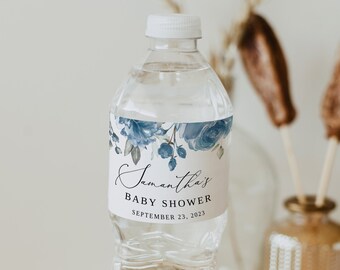 May include: A clear plastic water bottle with a white label that says "Samantha's Baby Shower September 23, 2023". The label has a blue floral design.