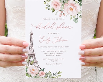 May include: A bridal shower invitation featuring a watercolor Eiffel Tower and pink roses. The invitation reads "Please join us for a bridal shower honoring Emily Johnson." The date and time are also included.