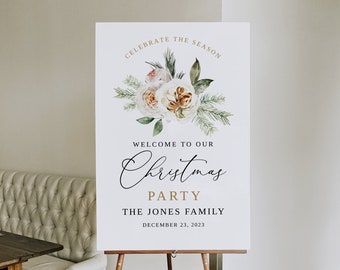 May include: A white sign with gold lettering announcing a Christmas party for the Jones family on December 23, 2023. The sign features a watercolor illustration of white and peach roses, pine branches, and pinecones.