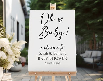 Pode incluir: Placa de boas-vindas branca com texto em caligrafia preta que diz "Oh Baby!" Bem-vindos ao Chá de Bebê de Sarah & Daniel em 16 de agosto de 2025.