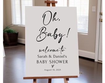 Pode incluir: Um cartaz de boas-vindas branco com texto em caligrafia preta que diz "Oh, Baby!" Bem-vindos ao Chuveiro de Bebê de Sarah & Daniel. 16 de agosto de 2025.