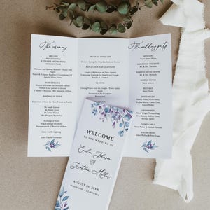 May include: A tri-fold wedding program featuring a white background with purple and blue floral illustrations. The front cover reads Welcome to the wedding of Emilia Johnson & Jonathan Miller, August 20, 20XX, Woodside, California, with ceremony details inside.