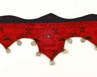 Hand embroidered belt.