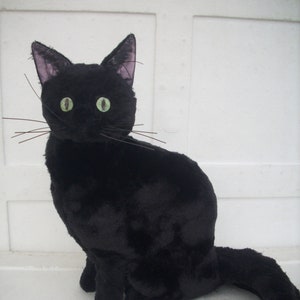 realistic stuffed black cat