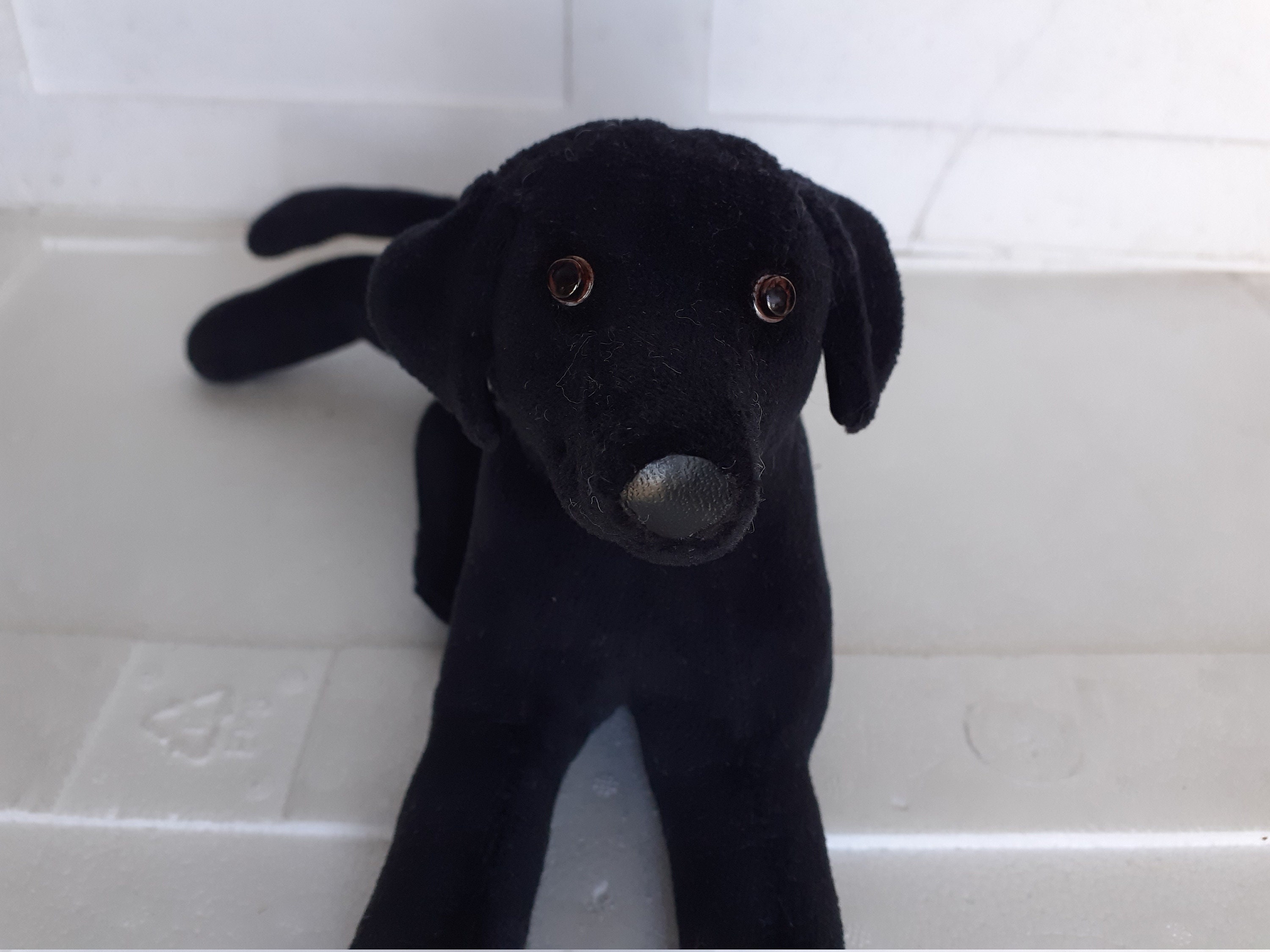 Peluche cane nero on sale