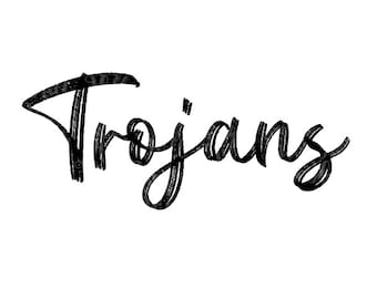 May include: The word Trojans is written in a black, hand-lettered script font with a textured, brush-stroke appearance. The letters are connected in a cursive style, featuring varying line thickness and visible dry brush details throughout the text.