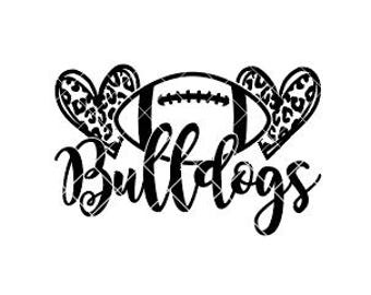 May include: A black graphic design featuring a central American football icon flanked by two hearts with a leopard print pattern. The word Bulldogs is written in a cursive script font underneath the football and hearts on a plain white background.