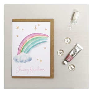 Biglietto d'auguri ad acquerello arcobaleno