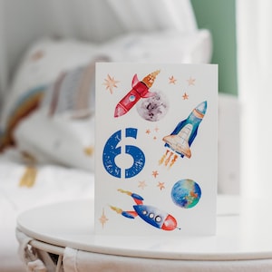 Tarjeta de cumpleaños personalizada con cohete y nave espacial: diseño personalizado pintado a mano con acuarela para cualquier edad