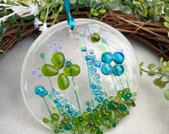 Fused glass window hanger in turquoise and lime green florals