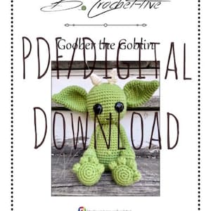 May include: A crochet pattern for a green goblin amigurumi toy. The pattern is available as a digital download. The image shows the finished toy sitting on a wooden surface. The text "Goober the Goblint PDF DIGITAL DOWNLOAD" is visible on the image.