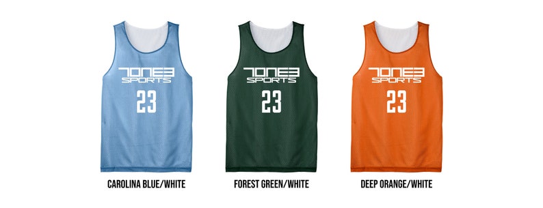 May include: Three reversible basketball jerseys in Carolina Blue/White, Forest Green/White, and Deep Orange/White. Each jersey features the text "TONE3 SPORTS" and the number "23" in white. The jerseys are displayed against a white background.
